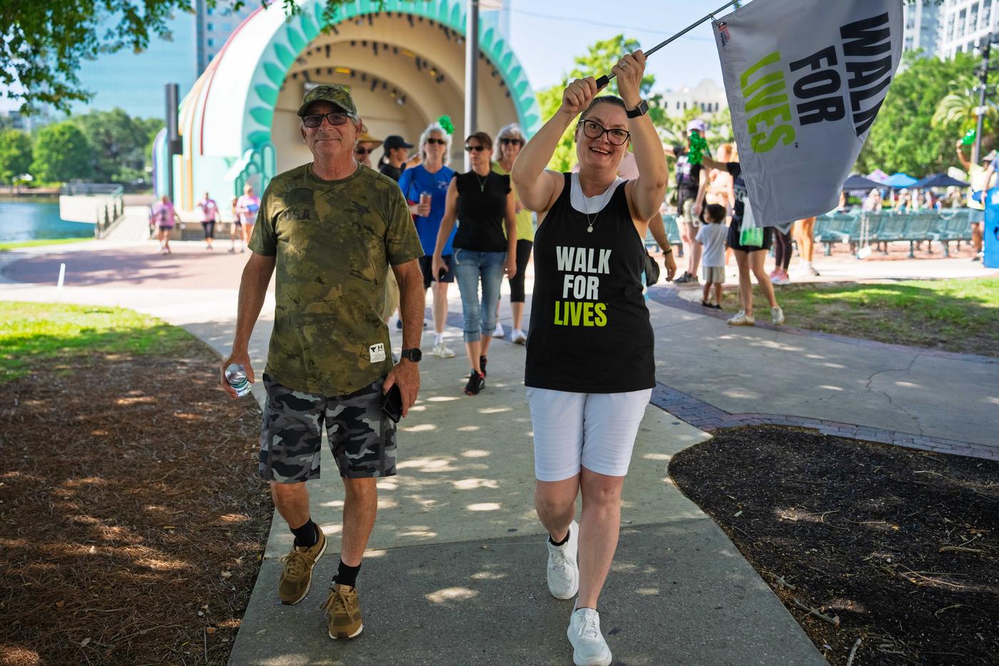 Walkers in Walk for Lives shirts walk together in Orlando